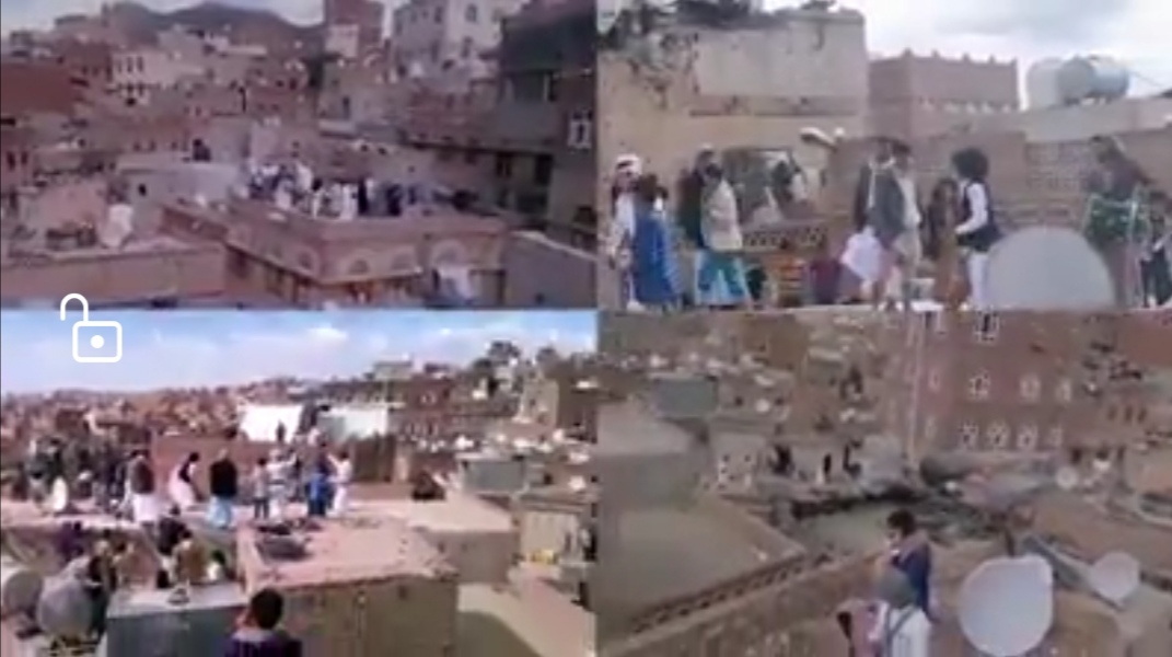 حفل زفاف يمني طريف من أسطح المنازل تطبيقًا لإجراءات التباعد “فيديو”